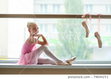 Beautiful young ballerina in ballet class. Beautiful young ballerina in ballet class. 79644251