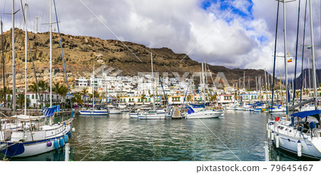 Best beaches of Gran Canaria - picturesque marina and town Puerto de Mogan, Canary islands Best beaches of Gran Canaria - picturesque marina and town Puerto de Mogan, Canary islands 79645467