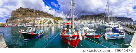 Best beaches of Gran Canaria - picturesque fishing harbor Puerto de Mogan Best beaches of Gran Canaria - picturesque fishing harbor Puerto de Mogan 79645470