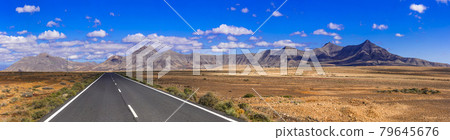 Impressive landscape and deserted roads of volcanic Fuerteventura , Canary islands 79645676
