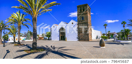 Landmarks of Fuerteventura - traditional colonial town La Oliva. Church of Candelaria in downtown Landmarks of Fuerteventura - traditional colonial town La Oliva. Church of Candelaria in downtown 79645687