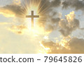 Christian cross appears bright in the gold sky 79645826