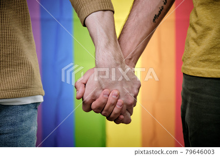 Gay Couple Holding Hands 79646003