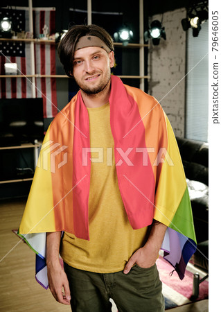 Young Man Wrapped in Ppride Flag 79646005