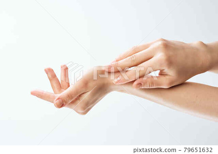 female hands skin care moisturizing medicine close-up female hands skin care moisturizing medicine close-up 79651632