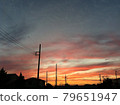 Clouds dyed red at sunset and the scenery of the city 79651947