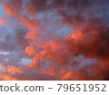 Clouds dyed orange at dusk in summer 79651952