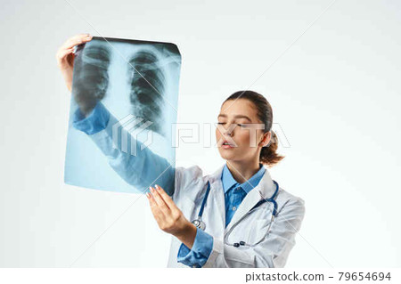 female doctor in white coat x-ray examination treatment 79654694