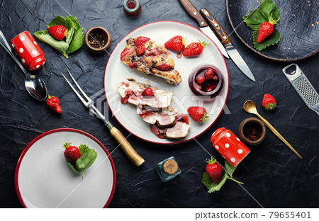 Chicken meat baked with strawberry Chicken meat baked with strawberry 79655401