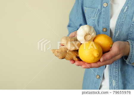 Woman hold alternative medicines in hands, space for text Woman hold alternative medicines in hands, space for text 79655976