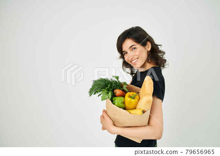 woman with a package of groceries health care delivery supermarket woman with a package of groceries health care delivery supermarket 79656965