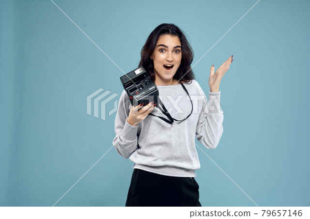 woman photographer with camera professional technology blue background woman photographer with camera professional technology blue background 79657146