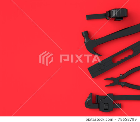 Top view of monochrome construction tools for repair on red and black Top view of monochrome construction tools for repair on red and black 79658799