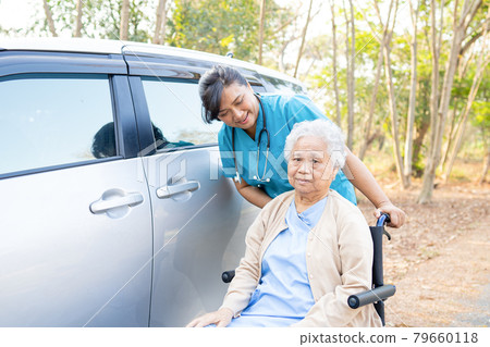 Doctor help and care Asian senior or elderly old lady woman patient sitting on wheelchair at nursing hospital ward; healthy strong medical concept 79660118