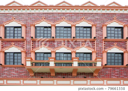 The windows of the building are colorful. The windows of the building are colorful. 79661338