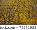 yellow paint pattern on old concrete wall 79661983