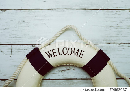 Lifebuoy Summer decoration with space copy on wooden background 79662687