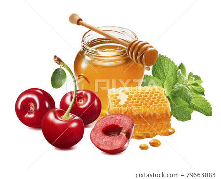 Sweet red cherries, mint and honey. Berries, glass jar and honeycomb isolated on white background Sweet red cherries, mint and honey. Berries, glass jar and honeycomb isolated on white background 79663083