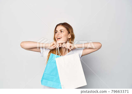 woman with multicolored bags buying lifestyle entertainment shopping 79663371