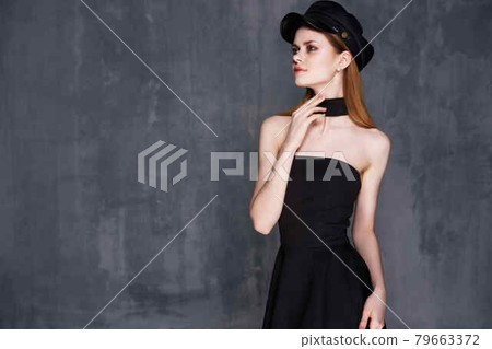 pretty woman in black dress makeup decoration fashion luxury 79663372