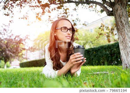 Young Woman in the Park Young Woman in the Park 79665194