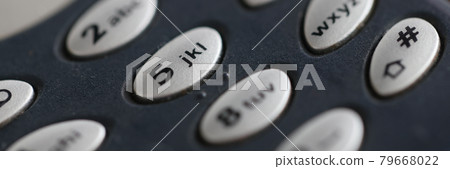 Closeup of buttons on mobile phone keyboard Closeup of buttons on mobile phone keyboard 79668022
