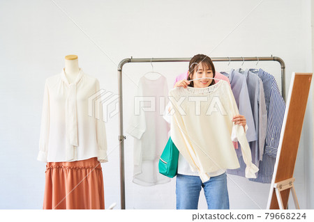 Young women's shop to choose clothes Select shop Clothes apparel 79668224