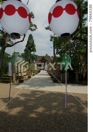 Tanabata paper strips and Mitarai Festival lanterns displayed on the side of the approach to the Sankomon Gate of Kitano Tenmangu Shrine in Kyoto Tanabata paper strips and Mitarai Festival lanterns displayed on the side of the approach to the Sankomon Gate of Kitano Tenmangu Shrine in Kyoto 79668386