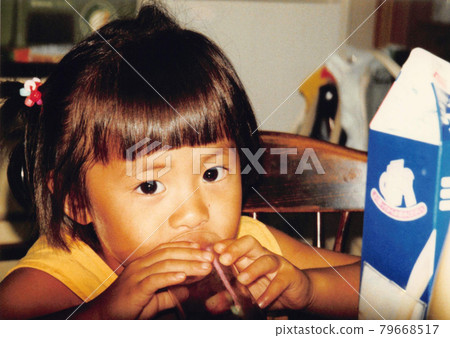 Girl drinking milk 79668517