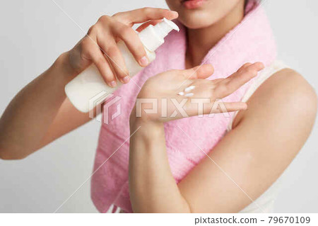 woman with towel on shoulders skin lotion spa treatments clean skin woman with towel on shoulders skin lotion spa treatments clean skin 79670109