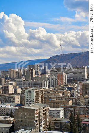 Panorama of a densely populated city. Tbilisi city landscape from above Panorama of a densely populated city. Tbilisi city landscape from above 79671696