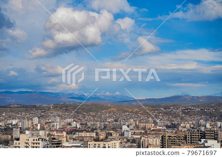 Panorama of a densely populated city. Tbilisi city landscape from above Panorama of a densely populated city. Tbilisi city landscape from above 79671697