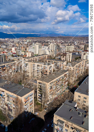 Panorama of a densely populated city. Tbilisi city landscape from above Panorama of a densely populated city. Tbilisi city landscape from above 79671698
