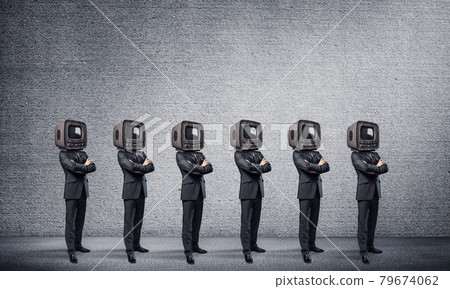 Businessmen with old TV instead of head. 79674062