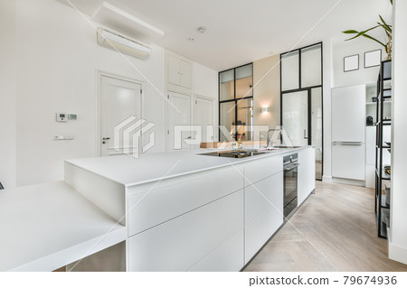 Interior of a beautiful kitchen of an elite house Interior of a beautiful kitchen of an elite house 79674936
