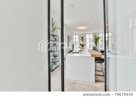 Interior of a beautiful kitchen of an elite house Interior of a beautiful kitchen of an elite house 79674939
