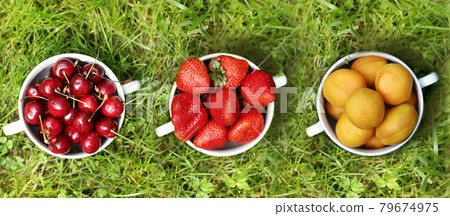healthy breakfast - strawberries sweet cherry apricots in bowl close up healthy breakfast - strawberries sweet cherry apricots in bowl close up 79674975