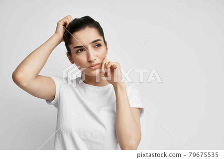 woman in white t-shirt health problem migraines health medicine treatment depression woman in white t-shirt health problem migraines health medicine treatment depression 79675535