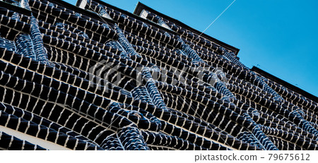 Abstract photograph of a brick house with dark bricks and white joints in a German old town 79675612