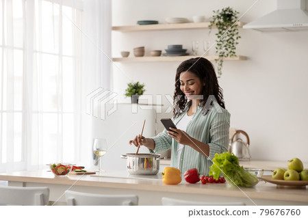 Chef enjoy food taste indoors. Modern mobile app for recipes Chef enjoy food taste indoors. Modern mobile app for recipes 79676760