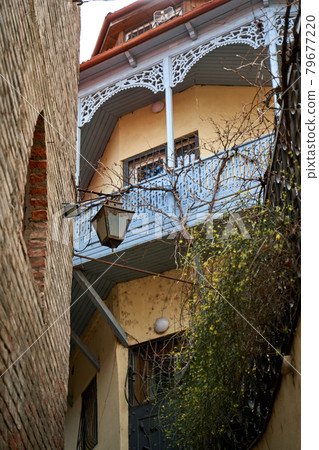 Cityscape of the old city of Tbilisi. Balcony of an old building. Soul and atmosphere of Georgia Cityscape of the old city of Tbilisi. Balcony of an old building. Soul and atmosphere of Georgia 79677220