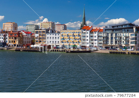 Swinoujscie. City embankment and bay on a sunny day. Swinoujscie. City embankment and bay on a sunny day. 79677284