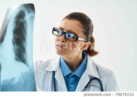 woman doctor hospital research diagnostics stethoscope examination 79678158