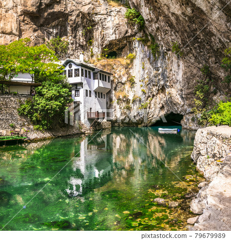 Blagaj Tekija: Beautiful Monastery Under A Cliff. Landmarks of Bosnia and Herzegovina Blagaj Tekija: Beautiful Monastery Under A Cliff. Landmarks of Bosnia and Herzegovina 79679989