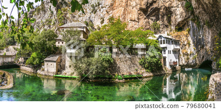 Blagaj Tekija: Beautiful Monastery Under A Cliff. Landmarks of Bosnia and Herzegovina Blagaj Tekija: Beautiful Monastery Under A Cliff. Landmarks of Bosnia and Herzegovina 79680041