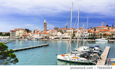 Travel in Croatia - beautiful Island Rab, view of old town and marine. Travel in Croatia - beautiful Island Rab, view of old town and marine. 79680064