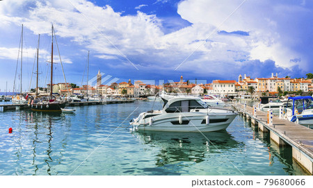 Travel in Croatia - beautiful Island Rab, view of old town and marine. Travel in Croatia - beautiful Island Rab, view of old town and marine. 79680066