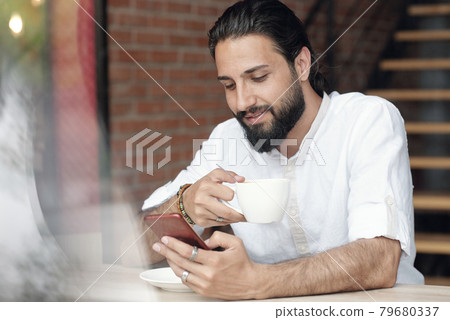 Handsome Bearded Man In Cafe Handsome Bearded Man In Cafe 79680337