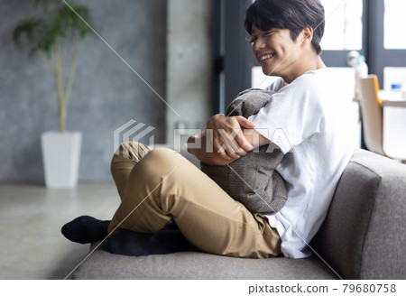 Young man relaxing in the room 79680758