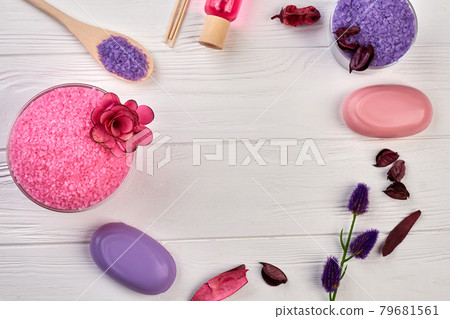 Top view set of spa accessories on white wooden table. 79681561